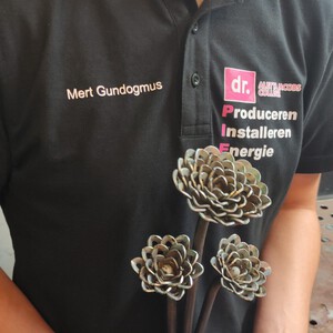 Mert zegt het met bloemen